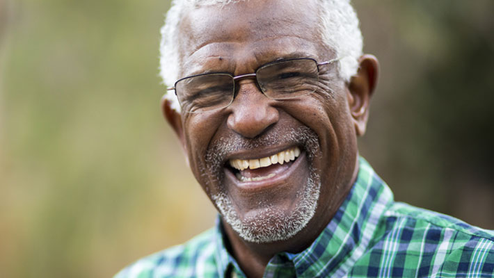 Smiling senior man with gray hair